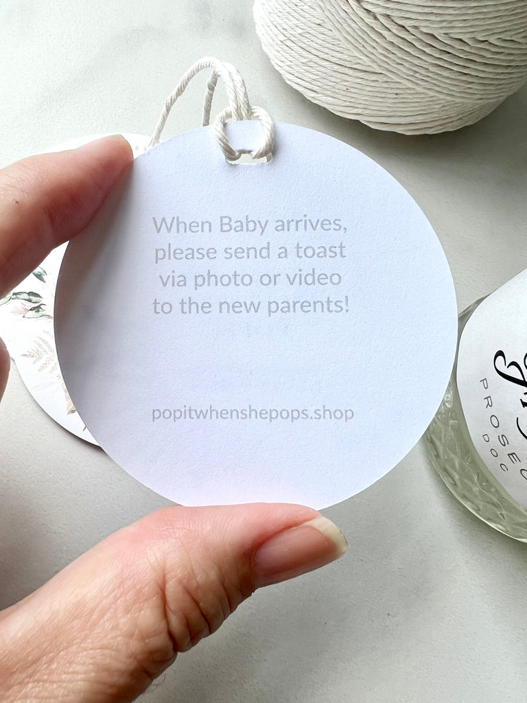 the back of our champagne tags has a message inviting baby shower guests to send a toast to the new parents when baby is born